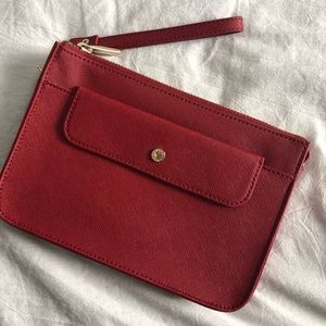 Red leather Danier wristlet! Never used - perfect cndtn . Authenticity card incl